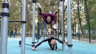 Outdoor Contortion. Two Circus Girls. Extreme Stretching. Flexshow