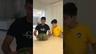 Jason and Alex open a watermelon