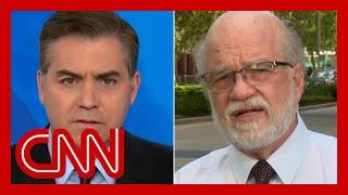 Jim Acosta challenges NRA board member