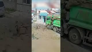 Elderly man on scooter gets buried by manure