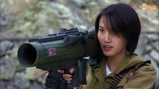 Action Movie: A female soldier blasts a Japanese officer with an armor-piercing round, killing her.