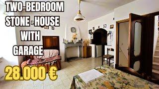 Two-bedroom stone house with garage in Castiglione Messer Marino, Abruzzo.