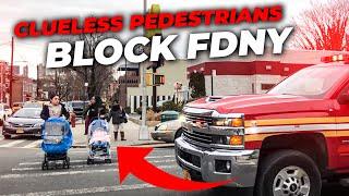 Two idiots don't yield to FDNY Emergency Vehicle & get scolded by police officers