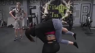 #workout girl lift and carry her friend for workout in gym