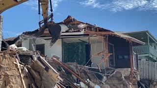 Demolition begins on eroded North Shore home