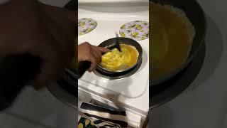 Cooking eggs for breakfast 
