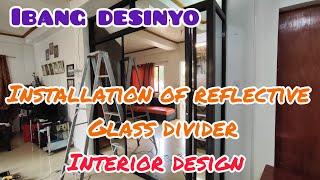 Reflective glass divider installation interior design