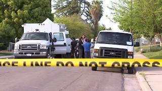 Neighbors watch as man stabs himself in a Kerman yard as part of suspected murder suicide