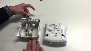 How to unmount an Aruba IAP 105 Access Point from the mounting bracket