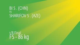 1/8 FS - 86 kg: S. SHARIFOV (AZE) df. S. BI (CHN) by TF, 10-0