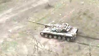 Russian T-64 tank breaks through a minefield in Ukraine