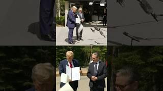 Trump Fumbles 'Very Important' UK Trade Documents at G-7