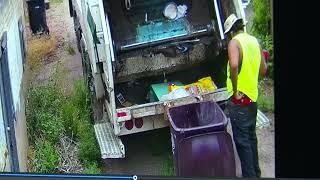 Homeowner catches trash company worker urinating on the job