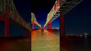 Crescent City Connection bridges spanning MissRiver at night in New Orleans #neworleans #bridges