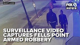 Surveillance camera captures Fells Point armed robbery, neighbor intervenes