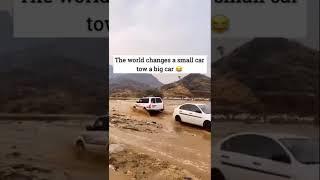 The world changes a small car tow a big car 