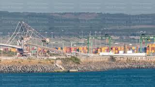 Aerial view of container cargo terminal of commercial port timelapse, business logistics and