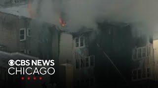Fire blasts through 2 apartment buildings on Chicago's Northwest Side
