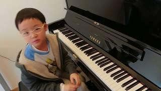 Moonlight Sonata Op.27 No.2 (Movement 3) of Beethoven (貝多芬 月光奏鳴曲 第三樂章), by Jonah Ho (age 7)