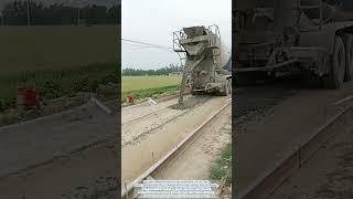 Rural Road Construction: Pouring Concrete with a Mixer Truck