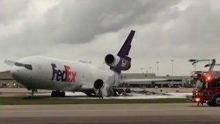 FedEx plane bursts into flames on runway