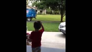 PJ waves to Garbage Truck