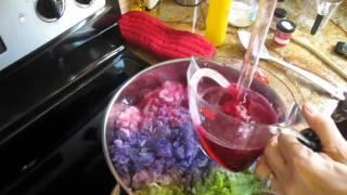 Dyeing wool on top of the stove with a dye stock solution