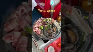 Eating octopus and abalone in Yeosu, Korea. #koreanfood #yeosu #southkorea #eatingoctopus #korea