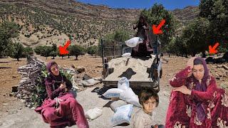 Helping the cameraman bring the hut's furniture to Khadija. Khadija's concern about the problems.