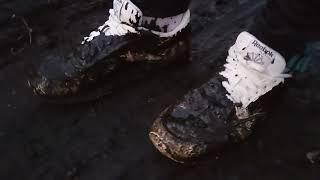 Evening walk through the muddy and wet forest with Reebok classic sneaker