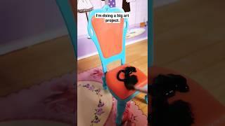 I'm creating a big art project. The Barbie chair turned black