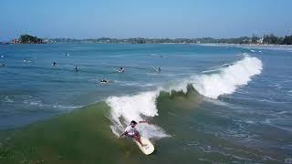 Surfer D.A.Lucky surfing in Weligama, Sri Lanka