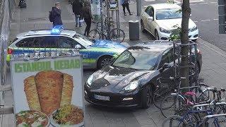 Falsch parkender Porsche blockiert Polizeiwagen auf Alarmfahrt am Bonner Suttner-Platz am 9.5.19