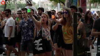 Spanish protesters squirt water at Barcelona tourists: ‘Go home’