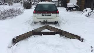 Scenic Snowy Drive in Lithuania forest. Snow blower test