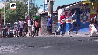 Residents displaced by gang violence in Haiti leave under peril