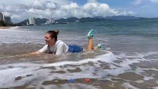 OMG! Huge waves! Wet denim skirt, wet Nike sneakers, wet white t-shirt  Wetlook • wet jeans