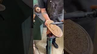 The process of filling the sole with sawdust