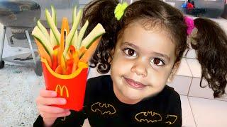 Children are taught to eat vegetables : Adel sami amira