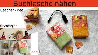 Buchtasche mit Fächern für ein Lesezeichen, Stift, Leselampe