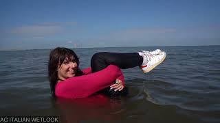 Wetlook - Eva fully clothed at the sea - Preview