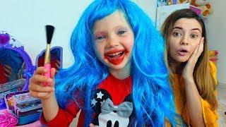 Nastya and Tasya play in a beauty salon for kids