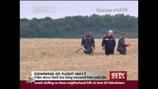 MH17: Video shows flight recorder recovered from crash site