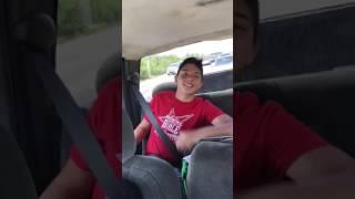 Shawn and Caleb asleep in the truck