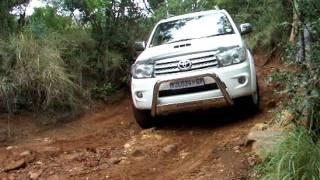 Toyota Fortuner 3.0L D4D Off Road going down an Axle Twisters at the De Wildt 4x4 eco track