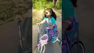 Samantha Tapia riding her bicycle.