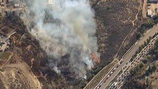 Fire crews battle brush fire in Poway