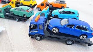 Burago tow truck of various colors 8 pieces