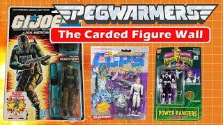 The Carded Figure Wall - Pegwarmers