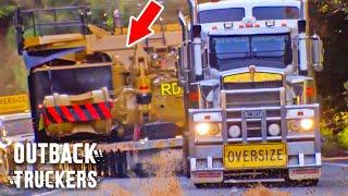 Truck Hauls 100 Tonne Mining Machine Over Melting Roads